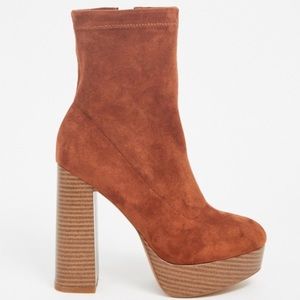 Platform booties, brand new
